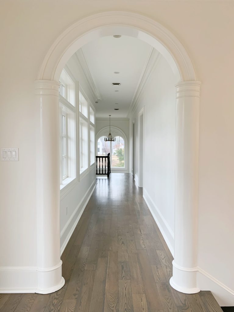 Hallway painted in Benjamin Moore Swiss coffee OC-45 interior painting service